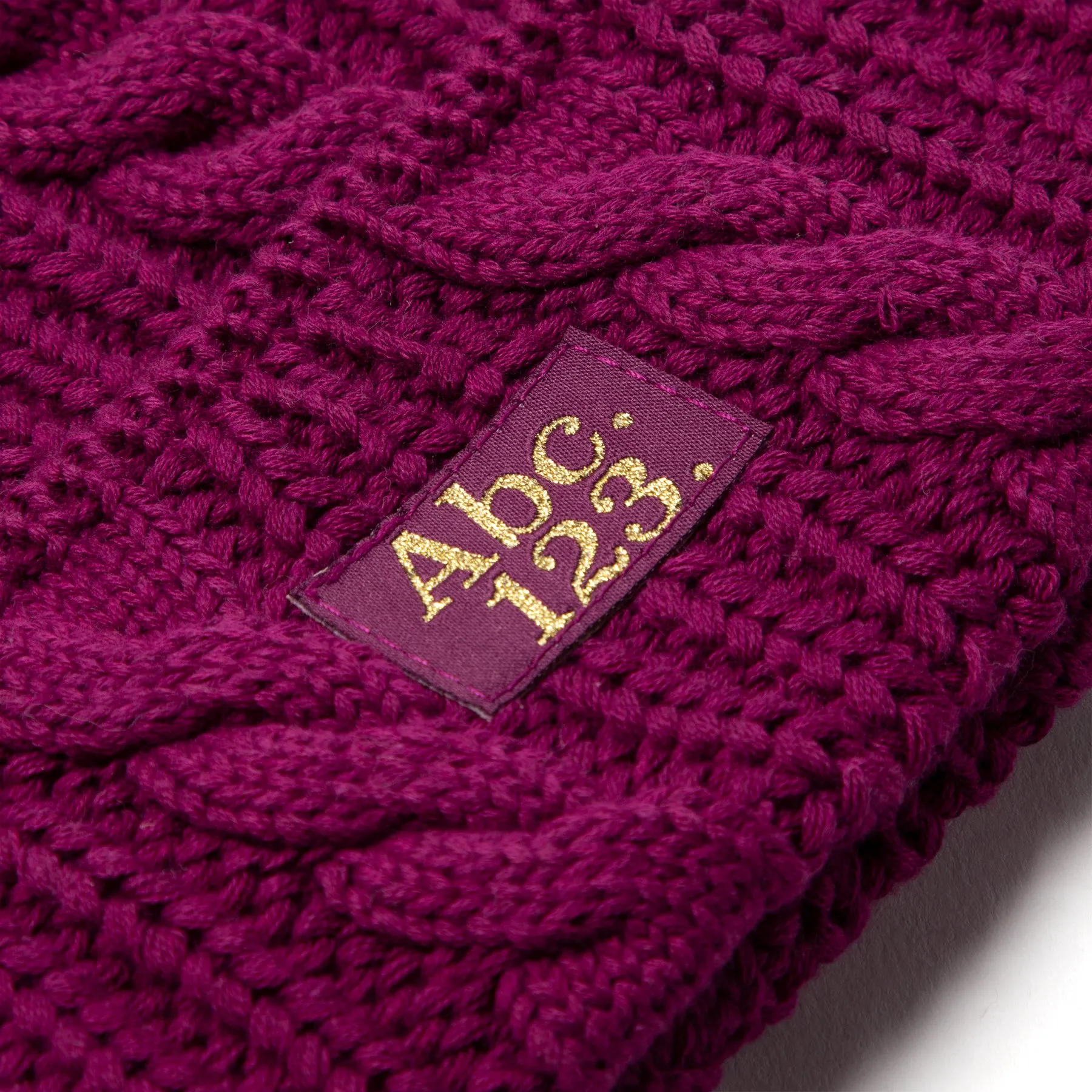 Advisory Board Crystals Abc. 123. Cableknit Beanie (Rhodolite Purple)